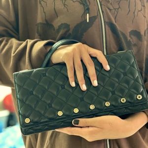 Authentic St. John quilt leather clutch